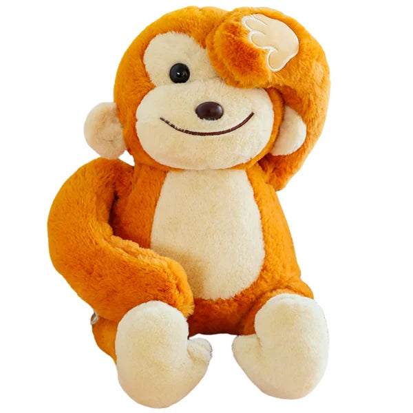 Muñeco de peluche mono tierno
