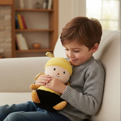 Peluche abeja bebé en brazos