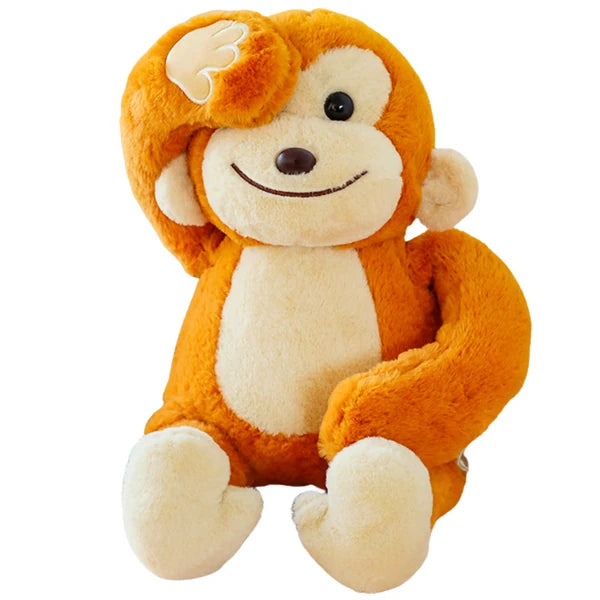 Peluche mono naranja suave para niños