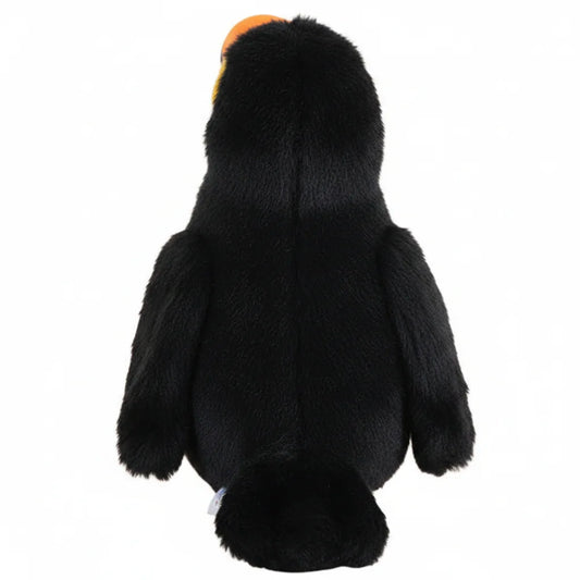 Tucán de peluche blanco y negro