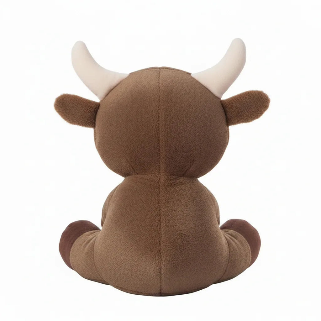 Vaca de peluche marrón para niños
