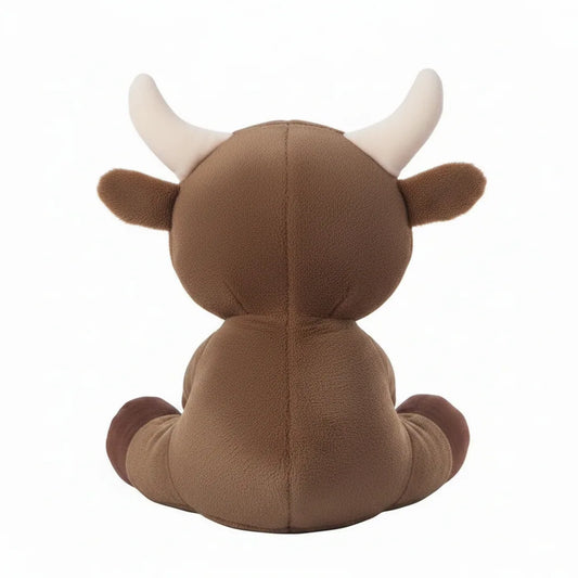 Vaca de peluche marrón para niños